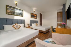 Myrtle Boutique Hotel 객실 침대