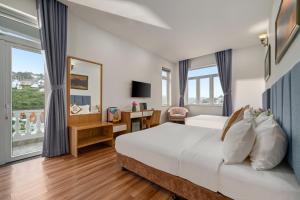 Myrtle Boutique Hotel 객실 침대