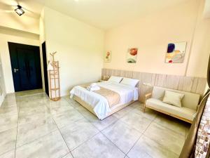 Postel nebo postele na pokoji v ubytování 睡飽飽民宿 Sleeping Well B&B 全新電梯民宿