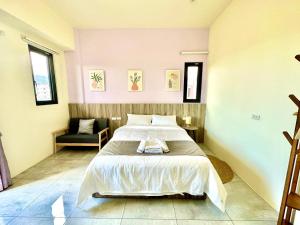 Postel nebo postele na pokoji v ubytování 睡飽飽民宿 Sleeping Well B&B 全新電梯民宿