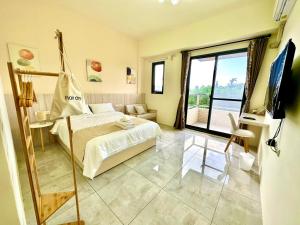Postel nebo postele na pokoji v ubytování 睡飽飽民宿 Sleeping Well B&B 全新電梯民宿