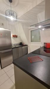 Kuchyň nebo kuchyňský kout v ubytování Logement entier : appartement, Houssen