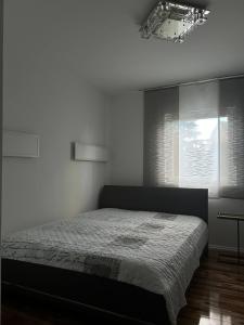 Ένα ή περισσότερα κρεβάτια σε δωμάτιο στο Ferienwohnung Patrick