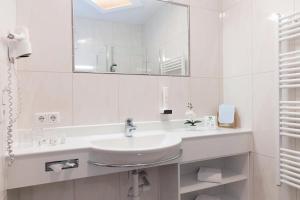 Kopalnica v nastanitvi Gasthof Hotel Schermer