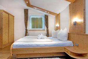 Postelja oz. postelje v sobi nastanitve Gasthof Hotel Schermer