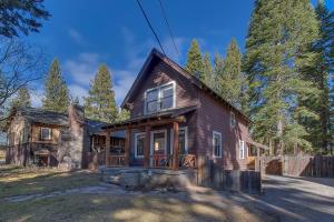 an old wooden house in the woods at Vanni House - Classic Tahoe Style 2 BR - Sleeps 6 - Hot Tub - Near Palisades & Downtown Tahoe City in Tahoe City