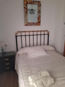 Postel nebo postele na pokoji v ubytování Casa Los García