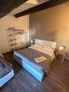 a bedroom with a large bed in a room at B&B Magnolia in Verona