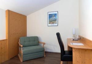 Predel za sedenje v nastanitvi Gasthof Hotel Schermer