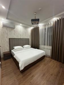 Ένα ή περισσότερα κρεβάτια σε δωμάτιο στο Hello Dushanbe Hostel