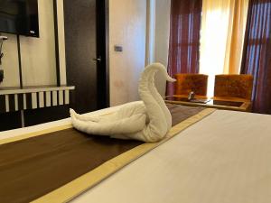 Postel nebo postele na pokoji v ubytování HOTEL PLEASANT VIEW