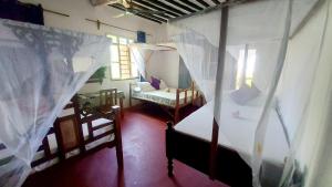 an overhead view of a bedroom with two bunk beds at Jacob's Inn Jambiani in Jambiani