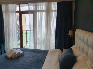 Letto o letti in una camera di The Fresh Wave hotel