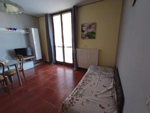 TV a/nebo společenská místnost v ubytování Appartamento Bersani