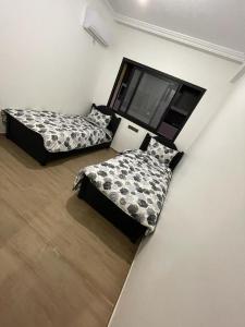 Llit o llits en una habitació de Appartement centre Marrakech