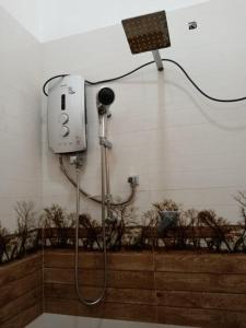 a shower in a bathroom with a shower at Dream Villa in Matara