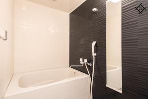 Et badeværelse på Shinsaibashi Dotonbori