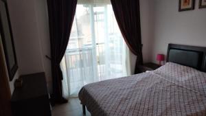 Łóżko lub łóżka w pokoju w obiekcie CASA DEl SOL PLAYA PUERTO BLANCO