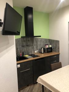 Kuchyň nebo kuchyňský kout v ubytování Ferienwohnung Zeitler