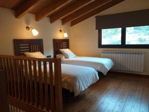 Les Flors - Hotel Rural & Cabanyes客房内的一张或多张床位