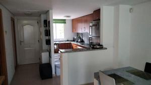 Kuchnia lub aneks kuchenny w obiekcie CASA DEl SOL PLAYA PUERTO BLANCO