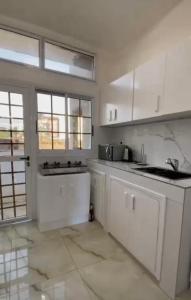 Kjøkken eller kjøkkenkrok på White Palm Residence