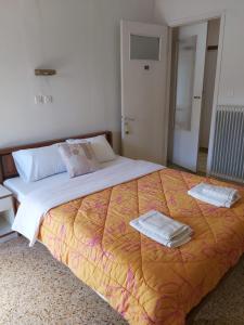 Postel nebo postele na pokoji v ubytování Ermis Hotel