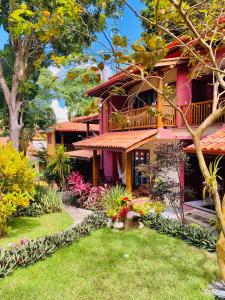 Um jardim em Paraíso Ecológico Pousada & SPA mais 37 fotos