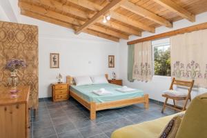 Et opholdsområde på Beautiful cottage house at Mesokampos