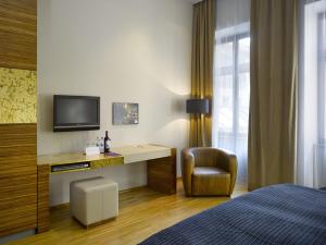 Posteľ alebo postele v izbe v ubytovaní The ICON Hotel & Lounge