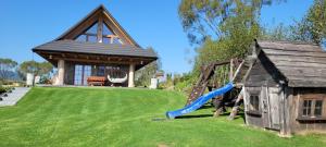 a playground with a gazebo and a slide at Odludomki in Smerek +123 photos
