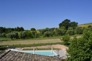 Bazén v ubytování Agriturismo Forestale Luti nebo v jeho okolí