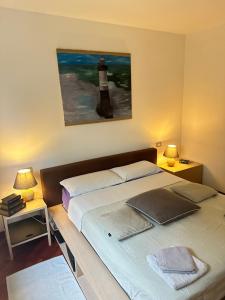 Giường trong phòng chung tại Trieste Sea Life