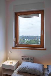 Postel nebo postele na pokoji v ubytování Yellow Lux apartment