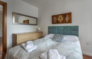 Łóżko lub łóżka w pokoju w obiekcie Rent like home - Pardałówka VI