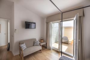 TV a/nebo společenská místnost v ubytování Bisu Isola di Sant'Antioco