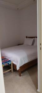 Ένα ή περισσότερα κρεβάτια σε δωμάτιο στο Essaouira Cool apartments +22 φωτογραφίες