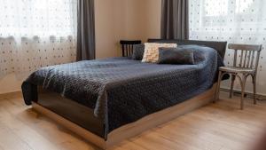 Ένα ή περισσότερα κρεβάτια σε δωμάτιο στο Fogad-lak