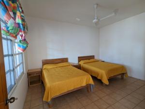 Cama o camas de una habitación en Bacocho - AC - INTERNET STARLINK - HOT WATER