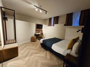 Postel nebo postele na pokoji v ubytování Hotel Washington