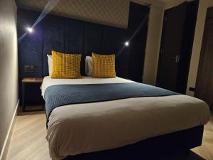 Postel nebo postele na pokoji v ubytování Hotel Washington