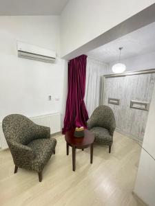Vila Zoe BucharestAirport&Therme&Parking Otopeni的休息区