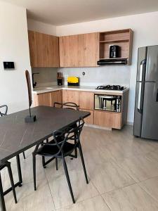 Imagen de la galería de Apartamento 306 - Vista a la Represa - 1 Habitación - Rentas Cortas Gerencial, en Guatapé