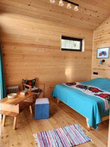 Postel nebo postele na pokoji v ubytování Skijis Sakhli