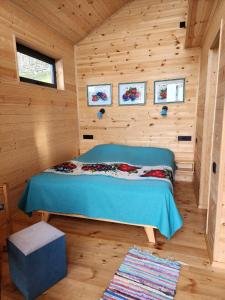 Postel nebo postele na pokoji v ubytování Skijis Sakhli
