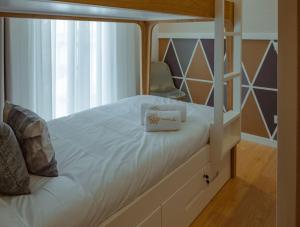 Postel nebo postele na pokoji v ubytování Pedra de Sal - Hostel & Suites