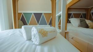 Postel nebo postele na pokoji v ubytování Pedra de Sal - Hostel & Suites
