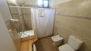 Koupelna v ubytování Hotel Viola