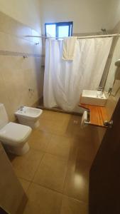 Koupelna v ubytování Hotel Viola