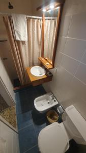Koupelna v ubytování Hotel Viola